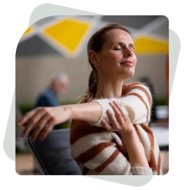 Woman stretching her arm with calmness